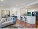 Inviting living space features a modern kitchen with breakfast bar seating and an adjacent dining area at 975 N Lincoln St # 3H, Denver, CO 80203