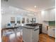 Open floor plan with a spacious kitchen and a well-lit living area at 975 N Lincoln St # 3H, Denver, CO 80203
