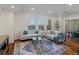 Bright living room featuring modern furniture, natural light, and stylish decor creating an inviting space at 975 N Lincoln St # 3H, Denver, CO 80203