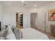 Bright main bedroom featuring ensuite bath and walk in closet at 975 N Lincoln St # 3H, Denver, CO 80203