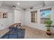 Bright office space with a modern desk, carpet flooring and natural light at 975 N Lincoln St # 3H, Denver, CO 80203