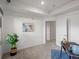 Bright office space with a modern desk, carpet flooring and natural light at 975 N Lincoln St # 3H, Denver, CO 80203