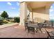 Outdoor patio with landscaping, wrought-iron tables and chairs and a grill at 975 N Lincoln St # 3H, Denver, CO 80203