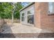 View of home's backyard showing the concrete patio and small privacy fence at 12717 E Cornell Ave, Aurora, CO 80014