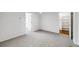 This bedroom includes a closet, updated carpet and trim, and easy access to the main bathroom at 12717 E Cornell Ave, Aurora, CO 80014