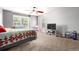 Bedroom with carpet, ceiling fan, 2 windows and a TV at 3505 Dinosaur St, Castle Rock, CO 80109
