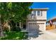 Charming two-story home featuring a two-car garage and a well-maintained lawn, perfect for suburban living at 3505 Dinosaur St, Castle Rock, CO 80109