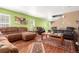Comfortable living room featuring hardwood floors, ample seating, and stylish decor, perfect for relaxation at 3505 Dinosaur St, Castle Rock, CO 80109