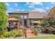 Large backyard featuring beautiful landscaping, covered pergola, patio and outdoor grill at 11961 S Saunter Ln, Parker, CO 80138