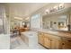 Spacious bathroom features soaking tub, double vanity, and separate shower at 11961 S Saunter Ln, Parker, CO 80138