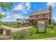 Charming coffee house with outdoor seating area and views of the community at 11961 S Saunter Ln, Parker, CO 80138