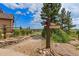 Scenic walking trail with wooden signs pointing towards a recreation center at 11961 S Saunter Ln, Parker, CO 80138