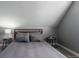 Cozy bedroom featuring sloped ceiling and minimalist decor, creating a serene atmosphere at 5250 S Huron Way # 13-312, Littleton, CO 80120