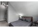 Well-lit bedroom with vaulted ceilings features a neutral decor and carpet at 5250 S Huron Way # 13-312, Littleton, CO 80120