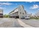 Modern exterior with covered parking, multi-level balconies, and landscaped surroundings at 5250 S Huron Way # 13-312, Littleton, CO 80120