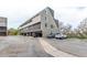 Apartment building with covered parking and a well-maintained landscape, creating a welcoming atmosphere at 5250 S Huron Way # 13-312, Littleton, CO 80120