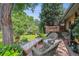 Relaxing backyard deck with seating area and greenery at 2872 S Zenobia St, Denver, CO 80236