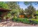 Charming backyard patio with lush landscaping at 2872 S Zenobia St, Denver, CO 80236