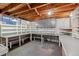 Finished basement workshop with ample shelving and workspace at 2872 S Zenobia St, Denver, CO 80236