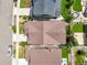 Aerial view of a single-Gathering home showcasing the roof, landscaping, and surrounding neighborhood at 8056 Piney River Ave, Littleton, CO 80125
