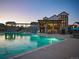 A luxurious community pool next to an entertainment structure creates a resort-style experience at 8056 Piney River Ave, Littleton, CO 80125