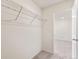 A walk-in closet with wire shelving and neutral carpet is ready for organizing at 13458 E 111Th Ave, Commerce City, CO 80022