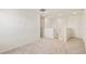 A bright loft area features neutral carpet, recessed lighting, and white walls at 13458 E 111Th Ave, Commerce City, CO 80022
