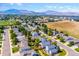 Aerial view of neighborhood with mountain views in the background at 11228 W Progress Ave, Littleton, CO 80127