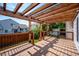 Backyard deck with pergola, providing a relaxing outdoor space at 11228 W Progress Ave, Littleton, CO 80127