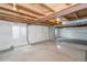 Unfinished basement with ample storage space at 11228 W Progress Ave, Littleton, CO 80127