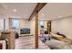 Spacious basement with natural light, laminate flooring, and unfinished features at 7465 S Ivy Way, Centennial, CO 80112
