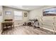 Versatile office space with a desk, keyboard, and ample natural light at 7465 S Ivy Way, Centennial, CO 80112