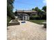 Backyard with large brick patio and shed; plenty of space for relaxing and entertaining at 9486 Pelon Dr, Denver, CO 80260