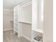 Spacious walk-in closet featuring custom shelving at 306 E Iowa Ave, Berthoud, CO 80513