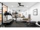 Spacious gym area featuring a treadmill, pilates machine, and mirrored wall at 1035 S Josephine St, Denver, CO 80209