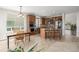 Spacious kitchen with stainless steel appliances, an island with bar seating, and stylish cabinetry at 1335 Galactic Pl, Castle Rock, CO 80108