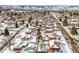 Aerial view of suburban neighborhood with snow-covered homes at 13390 W 8Th Ave, Lakewood, CO 80401