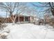 Large backyard with snowy ground and deck at 13390 W 8Th Ave, Lakewood, CO 80401