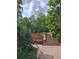 Steps leading to backyard, surrounded by greenery at 13390 W 8Th Ave, Lakewood, CO 80401