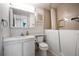 Bathroom with walk-in shower and built-in bathtub at 13390 W 8Th Ave, Lakewood, CO 80401