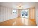 Bright bedroom with hardwood floors and sliding door at 13390 W 8Th Ave, Lakewood, CO 80401