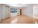 Living room with hardwood floors, large window, and ceiling fan at 13390 W 8Th Ave, Lakewood, CO 80401