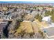 Aerial view of condo community with large open space area for recreation activities at 8335 Fairmount Dr # 4-102, Denver, CO 80247