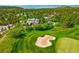 Beautiful home nestled within a lush landscape, adjoining an expansive golf course at 7332 Woodglen Pl, Castle Pines, CO 80108