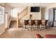 Finished basement with a bar area, seating, stairs and carpeted flooring at 7332 Woodglen Pl, Castle Pines, CO 80108