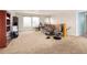 Spacious finished basement featuring a cozy seating area at 7332 Woodglen Pl, Castle Pines, CO 80108