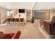 Basement featuring a bar, movie screen, comfortable seating, carpeted flooring and ample space at 7332 Woodglen Pl, Castle Pines, CO 80108