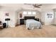 Bright bedroom features a neutral color palette, dormer windows, and a ceiling fan at 7332 Woodglen Pl, Castle Pines, CO 80108