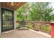 Cozy front porch with a decorative bench and charming details at 4285 Newland St, Wheat Ridge, CO 80033