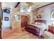 Bright bedroom with hardwood floors and ceiling fan at 2020 Arapahoe St # 1070, Denver, CO 80205